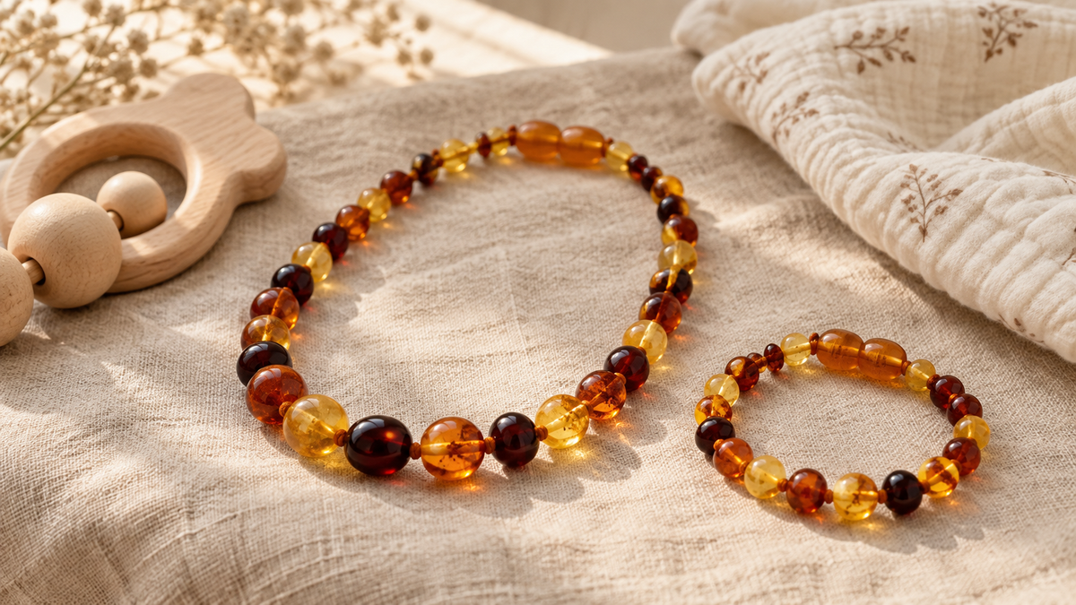Baltic amber teething necklace and bracelet on natural linen